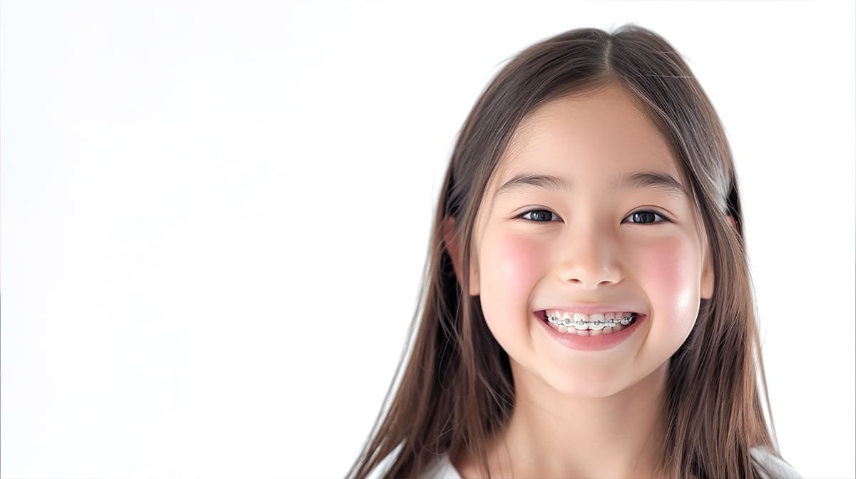 見出し画像 矯正器具を付けた女の子の笑顔